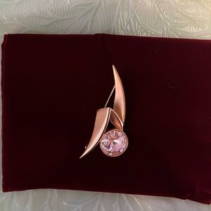 P.E.P. Gold tone brooch with large rhinestone